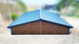 6×5,8m-es delux szigetelt mobilgarázs nyeregtetővel, sötét diófa falakkal, antracitszürke szekcionált kapuval és ajtóval, ablakkal, szellőzőráccsal, szegélyekkel, ereszcsatornával, antracitszürke cserepeslemez tetőborítással